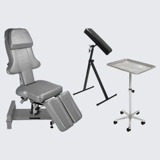 InkBed Hydraulic InkBed™ Complete Tattoo Package in grey, featuring a fully adjustable hydraulic bed, removable armrests, and a comprehensive set of accessories, ideal for comfort and efficiency in professional tattoo studios.